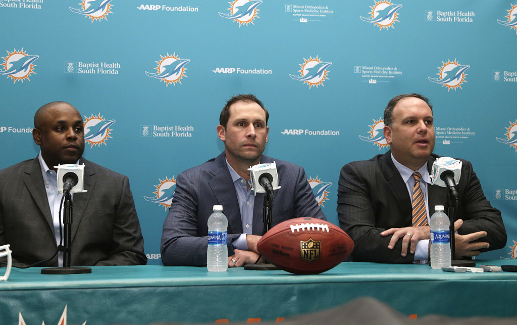 The 2016 Draft is in the books and these three Wise-Men are responsible: Miami Dolphins general manager Chris Grier, left, head coach Adam Gase, center, and Mike Tannenbaum.
