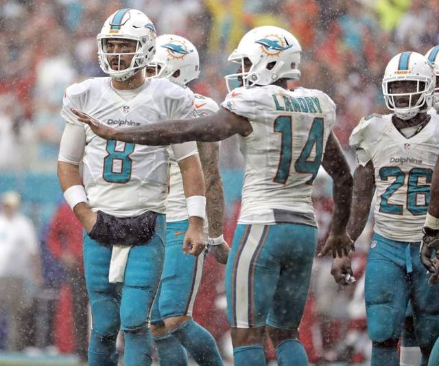 Matt Moore stepped in for an injured Ryan Tannehill and made plays that won the game.