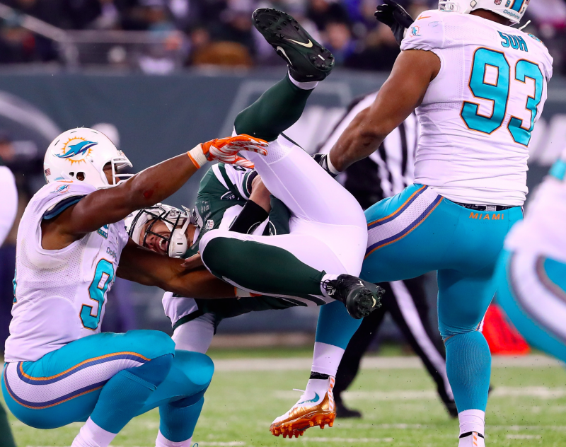 Dolphins crush the Jets 34-13 on their way to a winning season.